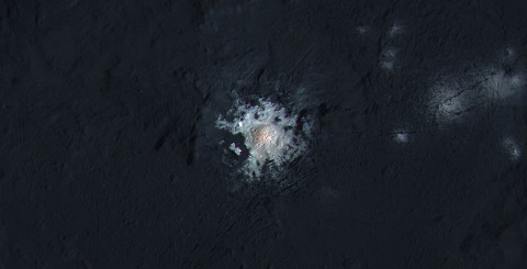 The bright spots of Occator Crater are shown in enhanced color in this view from NASA's Dawn spacecraft. (NASA/JPL-Caltech/UCLA/MPS/DLR/IDA/PSI/LPI)