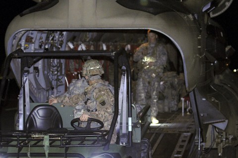 A crew chief with Alpha Company, 2nd Battalion (Assault), 10th Aviation Brigade, 10th Mountain Division, briefs 1st Battalion, 506th Infantry Regiment, 1st Brigade Combat Team, 101st Airborne Division (Air Assault) Soldiers at a safety brief during load out for an air assault mission Feb. 28, 2016, at Hangar 9, Fort Campbell, Ky. (Staff Sgt. Jesse Anderla, 1st Brigade Combat Team, 101st Airborne Division (Air Assault) Public Affairs)