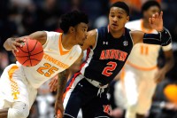 Tennessee Volunteers guard Shembari Phillips (25) drives the ball against Auburn Tigers guard Bryce Brown (2) during game one of the SEC Tournament at Bridgestone Arena. Tennessee won 97-59. (Joshua Lindsey-USA TODAY Sports)