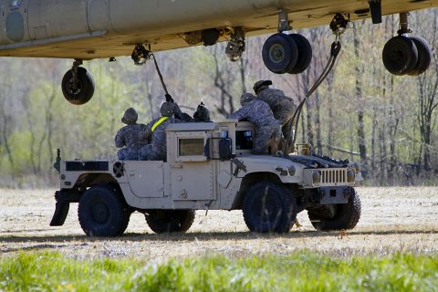 A sling load team from 227th Quartermaster Company, 129th Combat Sustainment Support Battalion, 101st Airborne Division Sustainment Brigade, 101st Airborne Division (Air Assault), attach a Humvee to a Ch-47 Chinook helicopter April 12, 2016, at Fort Campbell, Ky. (U.S. Army Sgt. Neysa Canfield, 101st Sustainment Brigade Public Affairs)