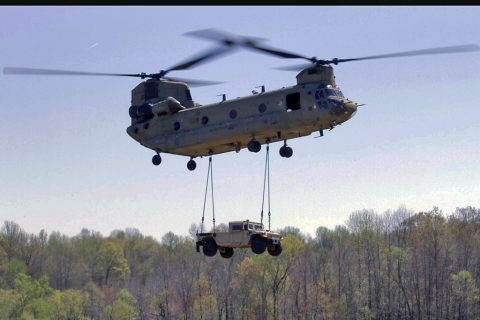 A CH-47 Chinook helicopter transports a Humvee after the sling load team from 227th Quartermaster Company, 129th Combat Sustainment Support Battalion, 101st Airborne Division Sustainment Brigade, 101st Airborne Division (Air Assault), attached the vehicle to the aircraft during battalion’s field training exercise on Fort Campbell, Ky., April 12, 2016. (U.S. Army Sgt. Neysa Canfield, 101st Sustainment Brigade Public Affairs)