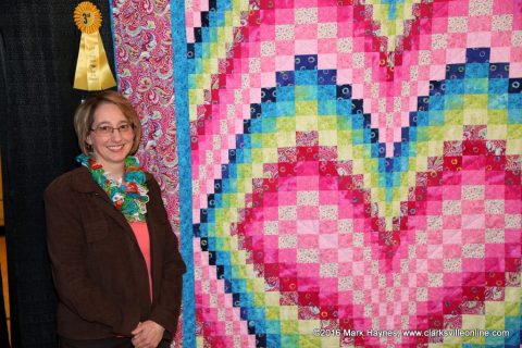 Dana Fucella with her quilt "Heart Bargello" that won third place in the Non-Traditional Bed Quilt category at Quilts of the Cumberland. Dana Fucella with her quilt "Heart Bargello" that won third place in the Non-Traditional Bed Quilt category at Quilts of the Cumberland.