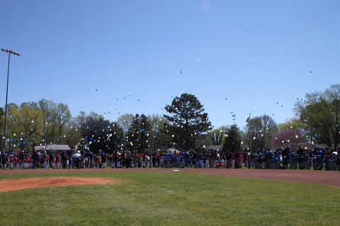 Clarksville Nationals Little League teams released balloons in honor of Detective Tyler Barrett.