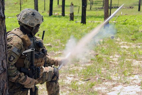 A Soldier with 1st Battalion, 327th Infantry Regiment, 1st Brigade Combat Team, 101st Airborne Division (Air Assault) shoots off a flare during a battalion live fire at the Peason Ridge training area April 10, 2016. (Operations Group Public Affairs)