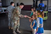 Girl Scouts give Packages of Cookies to Fort Campbell soldiers.