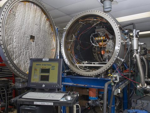 Within a controlled plasma chamber -- the High Intensity Solar Environment Test system -- tests will examine the rate of proton and electron collisions with a positively charged tether. Results will help improve modeling data that will be applied to future development of E-Sail technology concept. (NASA/MSFC/Emmett Given)