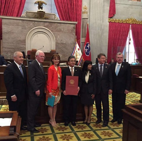 Rep. Curtis Johnson on the far right presented the House Joint Resolution to Mr. Kinefuchi (4th from left). Also, from the left is the governor’s chief of state, Jim Henry; House Finance Chairman, Charles Sargent; and Speaker of the House Beth Harwell.