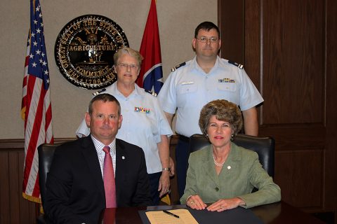 (L to R) Montgomery County Mayor Jim Durrett, Diane Gilman, USCG Auxiliary Flotilla Commander, William Welty, USCG Auxiliary Vice Flotilla Commander 082-11-07 Clarksville/Fort Campbell and City of Clarksville Mayor Kim McMillan. 