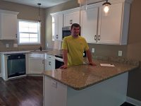 Eric Huneycutt inside his most recently completed home.