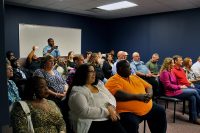 Family, friends, and coworkers watch the swearing in ceremony for seven new deputies Monday afternoon, May 2nd.