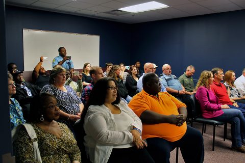 Family, friends, and coworkers watch the swearing in ceremony for seven new deputies Monday afternoon, May 2nd.