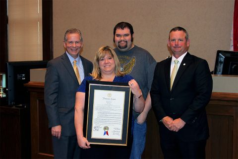 (L to R) Tennessee State Representative Joe Pitts, Margaret Davis, J.T. Davis, and Montgomery County Mayor Jim Durrett.