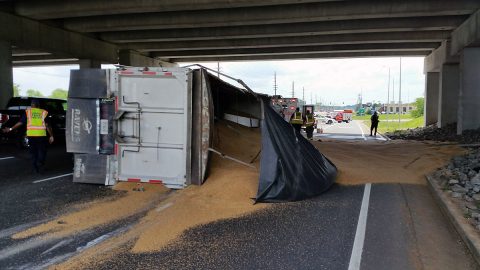 A Semi Truck hauling Grain overturned today on Fort Campbell Boulevard under the 101st Parkway overpass.