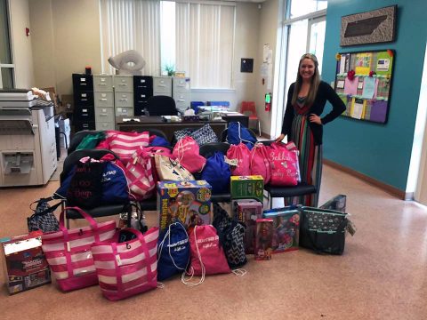 Bekkah Eaves with the bags she donated to the Montgomery County Safehouse.