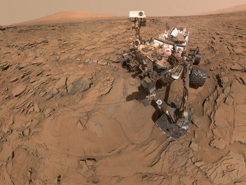 This May 11, 2016, self-portrait of NASA's Curiosity Mars rover shows the vehicle at the "Okoruso" drilling site on lower Mount Sharp's "Naukluft Plateau." The scene is a mosaic of multiple images taken with the arm-mounted Mars Hands Lens Imager (MAHLI). (NASA/JPL-Caltech/MSSS)