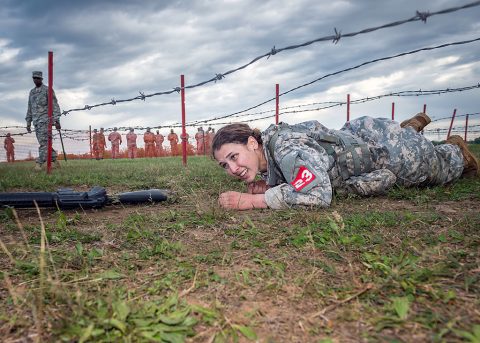 2nd Lt. Leah Mullenix, Team 23, 326th Brigade Engineer Battalion, 1st Brigade Combat Team, 101st Airborne Division (Air Assault), crawls under barbed wire with her individual assigned weapon during a low crawl event of the “x-mile” portion of the Best Sapper Competition at Fort Leonard Wood, Mo., April 21, 2016. The x-mile was the final phase of the three-day competition in which competitors had to complete a series of tasks in the quickest time possible. Mullenix was the first female, Army-wide, to complete the three-day competition and place in the top ten teams. (U.S. Army photo courtesy of Fort Leonardwood Public Affairs)