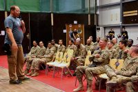 Comedian and Navy veteran Steve Mazan tells a joke to a group of service members deployed to Iraq as part of the Combined Joint Forces Land Component Command – Operation Inherent Resolve at the Eagle Fitness Center, Forward Operating Base Union III, Baghdad, June 21, 2016. Mazan co-headlined the Star Spangled Comedy Tour, organized by Armed Forces Entertainment, with comedians Stephen Thomas and Sam Fedele (not pictured). (Sgt. Katie Eggers)