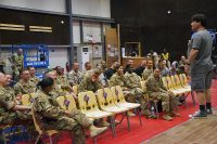 Comedian and former Marine Sam Fedele performs for a group of service members deployed to Iraq as part of the Combined Joint Forces Land Component Command – Operation Inherent Resolve at the Eagle Fitness Center, Forward Operating Base Union III, Baghdad, June 21, 2016. Fedele co-headlined the Star Spangled Comedy Tour, organized by Armed Forces Entertainment, with comedians Stephen Thomas and Steve Mazan (not pictured). (Sgt. Katie Eggers)