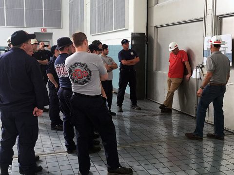 U.S. Army Corps of Engineers Nashville District employees, Ashland City Fire Department fire fighters, and Dickson County Fire Department fire fighters learn about the layout of the Cheatham Dam Powerhouse during a confined space rescue training exercise at the facility in Charlotte, Tennessee, May 24, 2016. (USACE photo by Josh Lowery)