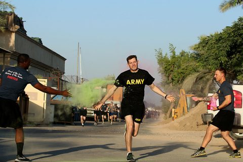 1st Lt. Benjamin Williams, executive officer for the Headquarters Support Company, Headquarters and Headquarters Battalion, 101st Airborne Division (Air Assault), runs through a color station during the Combined Joint Forces Land Component Command – Operation Inherent Resolve Color Run on Forward Operating Base Union III, Baghdad, July 2, 2016. (U.S. Army photo by Sgt. Katie Eggers/Released) 1st Lt. Benjamin Williams, executive officer for the Headquarters Support Company, Headquarters and Headquarters Battalion, 101st Airborne Division (Air Assault), runs through a color station during the Combined Joint Forces Land Component Command – Operation Inherent Resolve Color Run on Forward Operating Base Union III, Baghdad, July 2, 2016. (U.S. Army photo by Sgt. Katie Eggers/Released)