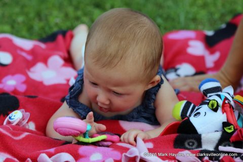 This little one is enjoying the Independence Day Celebration.