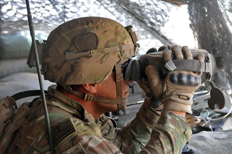 Sgt. Arturro Hernandez of Apache Troop, 1st Squadron, 75th Cavalry Regiment, Task Force Strike, looks through his binoculars during his guard shift June 18th, 2016, at Kara Soar Base, Iraq. Part of Troop A’s mission is protecting the artillery responsible for the fires at the Kara Soar Base. The fires at the Kara Soar Base serve two roles: force protection for Coalition and Iraqi security forces and fire in support of maneuver, enabling ISF to defeat Daesh. (1st Lt. Daniel Johnson) Sgt. Arturro Hernandez of Apache Troop, 1st Squadron, 75th Cavalry Regiment, Task Force Strike, looks through his binoculars during his guard shift June 18th, 2016, at Kara Soar Base, Iraq. Part of Troop A’s mission is protecting the artillery responsible for the fires at the Kara Soar Base. The fires at the Kara Soar Base serve two roles: force protection for Coalition and Iraqi security forces and fire in support of maneuver, enabling ISF to defeat Daesh. (1st Lt. Daniel Johnson)