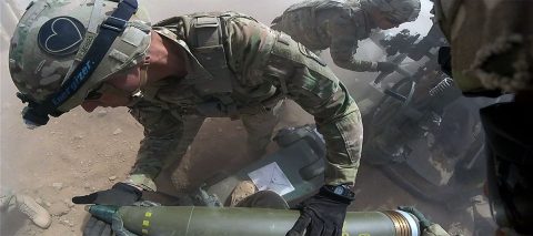 Staff Sergeant Carlos Mont with Battery C, 1st Battalion, 320th Field Artillery Regiment, Task Force Strike, inspects a round during a fires mission in Kara Soar, Iraq, June 10, 2016. As crew chief Mont is responsible for the safety of all personnel on the gun during firing. The fire missions at the Kara Soar Base serve two roles: to provide force protection for Coalition and Iraqi security forces and to support the Iraqi Security forces ground maneuver by providing indirect fire support, enabling them to defeat Da’esh. (U.S. Army photo by 1st Lt. Daniel Johnson/Released)