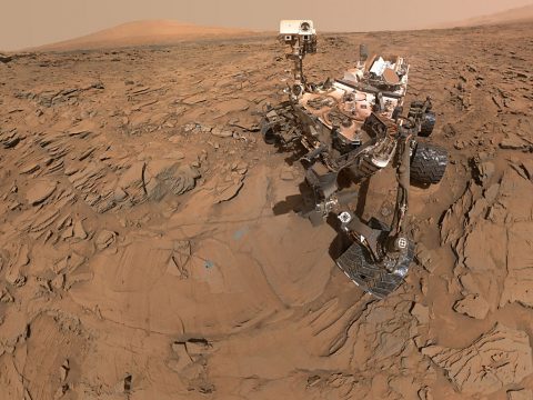 This May 11, 2016, self-portrait of NASA's Curiosity Mars rover shows the vehicle at the "Okoruso" drilling site on lower Mount Sharp's "Naukluft Plateau." The scene is a mosaic of multiple images taken with the arm-mounted Mars Hands Lens Imager (MAHLI). (NASA/JPL-Caltech/MSSS)