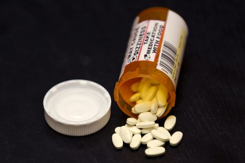 Prescription Drug Bottle open with numerous pills. (American Heart Association)