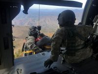 Tennessee Army National Guard Staff Sgt. Doug Edmisten operates the hoist bringing Flight Paramedic Staff Sgt. Giovanni Dezuani and a critically ill hiker out of the Great Smoky Mountains National Park March 30th. (Photo by National Park Ranger William Jaynes)