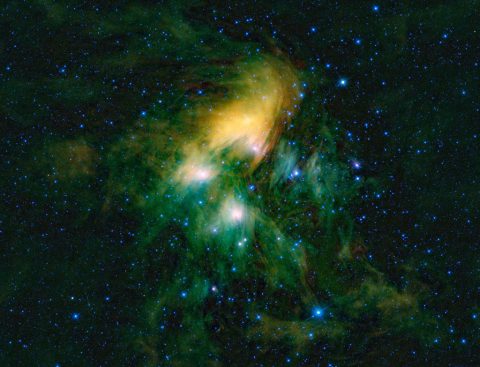 This image shows the famous Pleiades cluster of stars as seen through the eyes of WISE, or NASA's Wide-field Infrared Survey Explorer. (NASA/JPL-Caltech/UCLA)