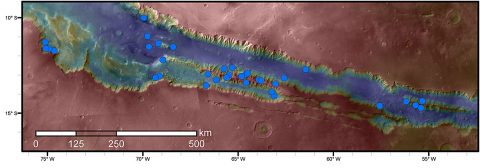 Blue dots on this map indicate sites of recurring slope lineae (RSL) in part of the Valles Marineris canyon network on Mars. RSL are seasonal dark streaks that may be indicators of liquid water. The area mapped here has the highest density of known RSL on Mars. (NASA/JPL-Caltech/Univ. of Arizona)