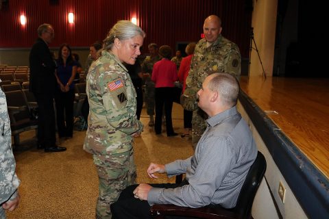 WTB Command Sgt. Maj. Staci Rea thanked Cpl. Matthew Bradford following the telling of his personal story of overcoming amputations and blindness. Soldiers stood in line to share their appreciation as Bradford met and spoke to them one-on-one following his inspirational talk of not giving up.