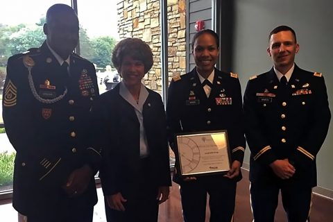 Left to right: Command Sgt. Maj. Frank Graham Jr., senior enlisted adviser for 101st Special Troops Battalion, 101st Airborne Division Sustainment Brigade, 101st Abn. Div. (Air Assault), Kim McMillan, mayor for the city of Clarksville, Tn., Lt. Col. Wally Vives-Ocasio, commander of the 101st STB, and 2nd Lt. Virgil A. Binion, executive officer for Charlie Detachment, 101st Financial Management Support Unit, 101st Abn. Div. Sust. Bde., take a photo together Sept. 1, 2016 after 101st STB received the Boots on ground award at the Partners in Education Breakfast at the Wilma Rudolph Event Center in Clarksville, TN. (Lt. Col. Wally Vives-Ocasio) 