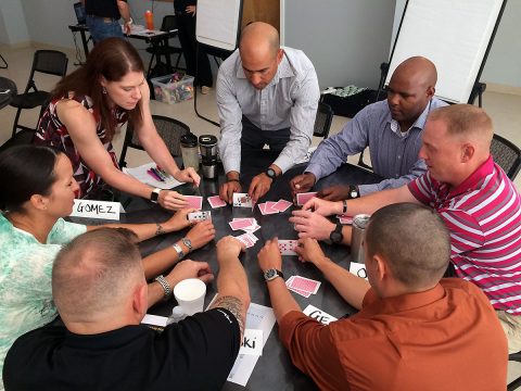 Soldiers and leaders from 101st Airborne Division Sustainment Brigade, 101st Abn. Div. (Air Assault), stand up playing cards during a teambuilding exercise Sept. 16, 2016, on Fort Campbell, Kentucky. (Staff Sgt. Kimberly Lessmeister/101st Airborne Division Sustainment Brigade Public Affairs) 