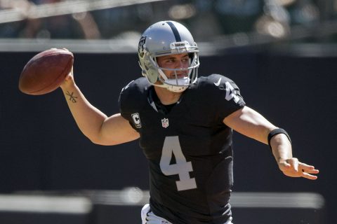 Oakland Raiders quarterback Derek Carr (4) passes the football against the Atlanta Falcons during the first quarter at Oakland Coliseum. (Kyle Terada-USA TODAY Sports)