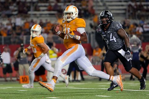 Tennessee Volunteers quarterback Joshua Dobbs (11) runs the ball against the Virginia Tech Hokies during the second half at Bristol Motor Speedway. Tennessee won 45 to 24. (Randy Sartin-USA TODAY Sports)