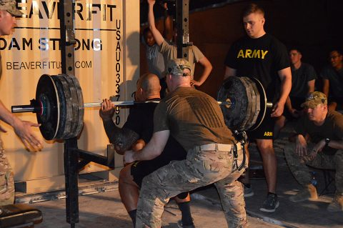 Soldiers and leaders with Task Force Strike gather to take part in the 1000-pound club competition Aug. 7, 2016, at Camp Swift, Iraq. The goal of the weightlifting tournament was to motivate Soldiers to give them goals to work toward and build morale. (Maj. Ireka Sanders) 