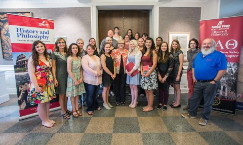 Austin Peay President Dr. Alisa White with the University's Phi Alpha Theta National Honor Society (PAT). Austin Peay President Dr. Alisa White with the University's Phi Alpha Theta National Honor Society (PAT).