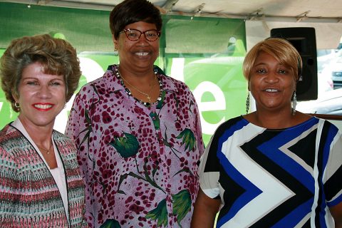 Clarksville Mayor Kim McMillan greets Angela Moore and Monalisa Barker, both of Clarksville, at the grand opening ceremony for the new Park & Ride at Exit 11. Moore and Barker ride the RTA’s 94X Express bus to and from work and say the service eliminates the stress and expense of driving and parking in Nashville.