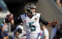 Jacksonville Jaguars quarterback Blake Bortles (5) drops to throw a pass during the second half of a football game against the Oakland Raiders at EverBank Field. The Raiders won 33-16. (Reinhold Matay-USA TODAY Sports)