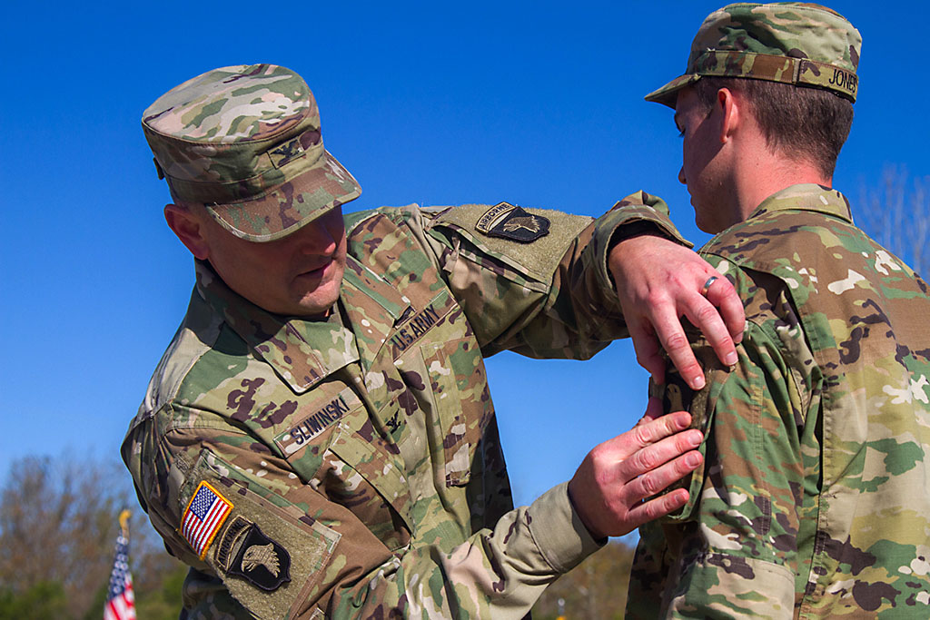 Col. Stanley Sliwinski, commander of the 101st Airborne Division Sustainment Brigade “Lifeliners,” 101st Abn. Div. (Air Assault), places the 101st Abn. Div. patch on a Soldier from 1176th Transportation Company, Oct. 23, 2016, during the companies patching ceremony in Smyrna, TN. (Sgt. Neysa Canfield/ 101st Airborne Division Sustainment Brigade Public Affairs)