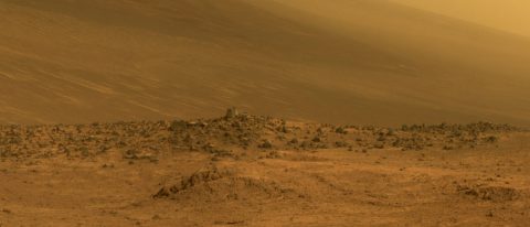 This scene from NASA's Mars rover Opportunity shows "Wharton Ridge," which forms part of the southern wall of "Marathon Valley" on the rim of Endeavour Crater. The ridge's name honors the memory of astrobiologist Robert A. Wharton (1951-2012). The scene is presented in approximately true color. (NASA/JPL-Caltech/Cornell/Arizona State Univ.)