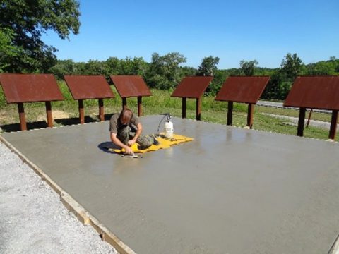 Capital Concrete of Nashville, Tennessee engraved a map of Golden Pond, Kentucky on a concrete pad for visitors to walk around the town. (Forest Service staff)