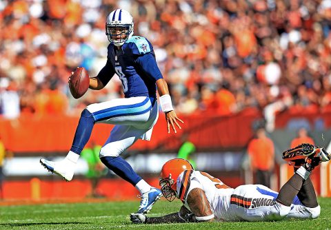 Tennessee Titans quarterback Marcus Mariota (8) gets away from a Cleveland Browns defender during the fourth quarter at FirstEnergy Stadium. (Andrew Weber-USA TODAY Sports)