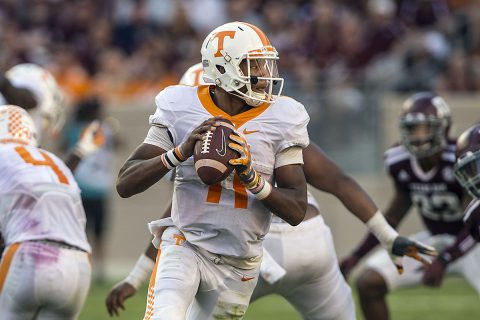 Tennessee Volunteers quarterback Joshua Dobbs (11) rolls out to pass against the Texas A&M Aggies during the second half at Kyle Field. The Aggies defeated the Volunteers 45-38 in overtime. (Jerome Miron-USA TODAY Sports)