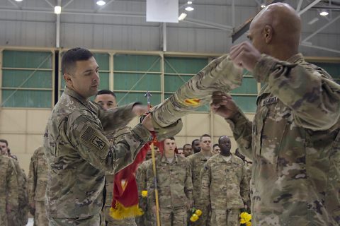 Lt. Col. James C. Reese (left), commander of 2nd Battalion, 44th Air Defense Artillery Regiment, 101st Airborne Division (Air Assault) Sustainment Brigade, 101st Abn. Div., and Command Sgt. Maj. Randy Gray, senior enlisted advisor for 2nd Bn., 44th ADA Regt., uncase the battalion colors, Nov. 5, 2016, at Hanger 3 on Fort Campbell, Ky. as symbol of the unit’s return home. (Sgt. Neysa Canfield/101st Airborne Division Sustainment Brigade Public Affairs) 