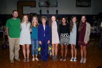 Clarksville Mayor Kim McMillan celebrates with the state championship CHS Girls Golf Team.