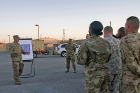 Sgt. 1st Class David M. Taylor, master fitness trainer for 101st Special Troops Battalion, 101st Airborne Division (Air Assault) Sustainment Brigade, 101st Abn. Div., explains the different stations of the Command Team Physical Training Challenge, Nov. 9, 2016, to senior leaders of the brigade at the 74th Composite Transportation Company motor pool on Fort Campbell, Ky. (Sgt. Neysa Canfield/101st Airborne Division Sustainment Brigade Public Affairs)