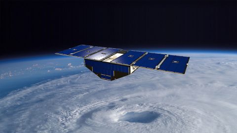 Artist's concept of one of the eight Cyclone Global Navigation Satellite System satellites deployed in space above a hurricane. (NASA)